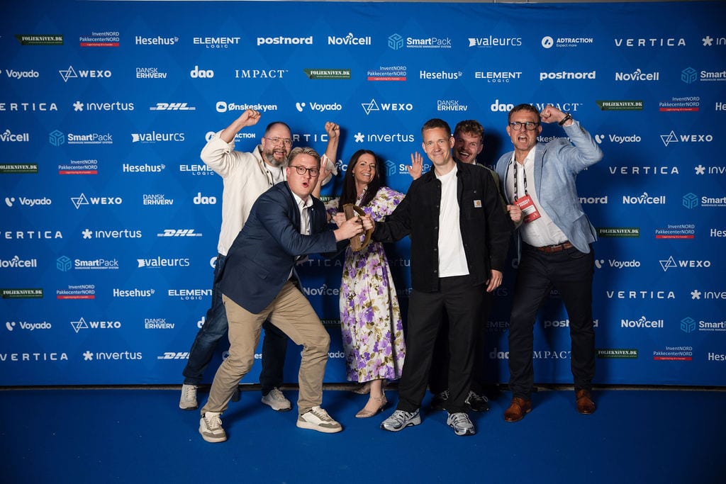 The Damstahl and Slize team celebrating with their trophy at the Danish E-commerce Awards